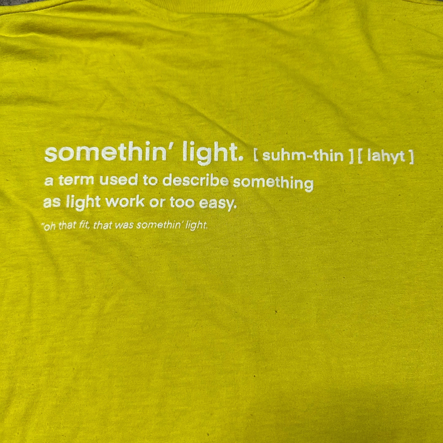 “somethin’ light” tee