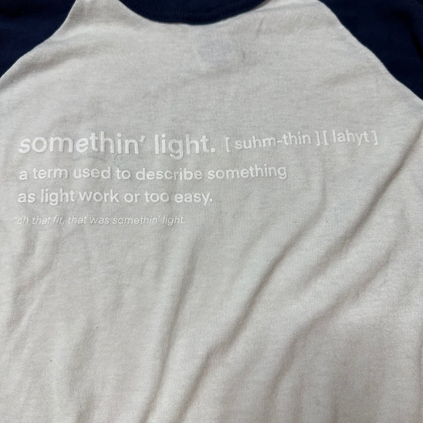 “somethin’ light” Baseball Tee