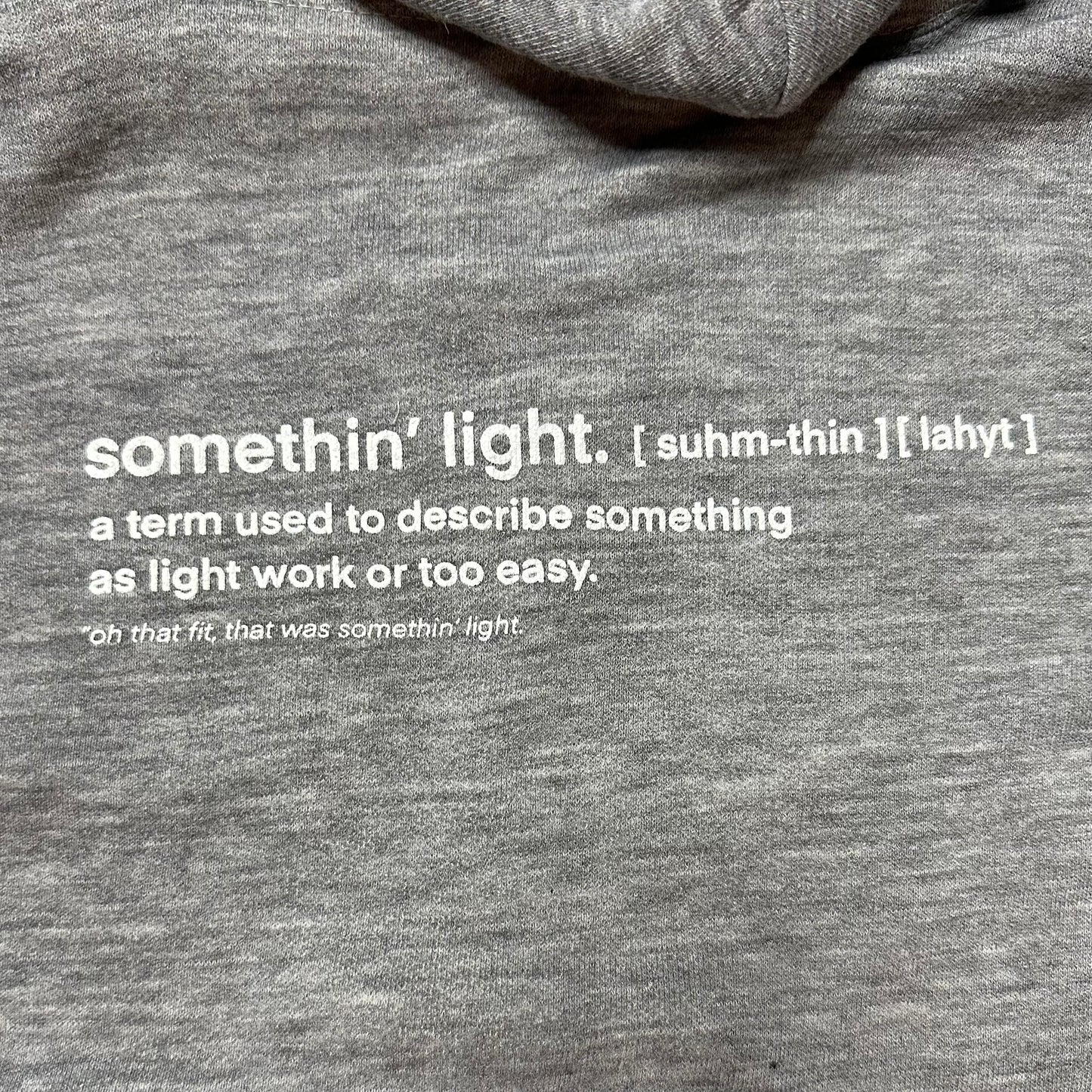 “somethin’ light” Zip Up Hoodie